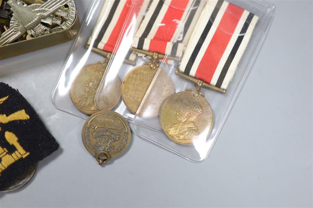 A quantity of Military and Civilian medals / badges